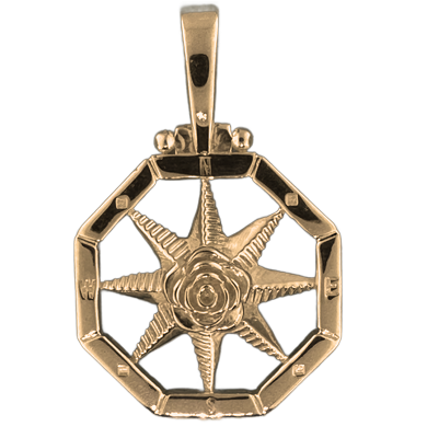 Compass rose pendants in sterling silver.  Original designs from TS. Brown Jewelry.