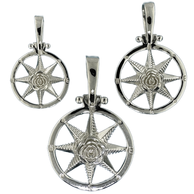 Compass rose pendants in sterling silver.  Original designs from TS. Brown Jewelry.